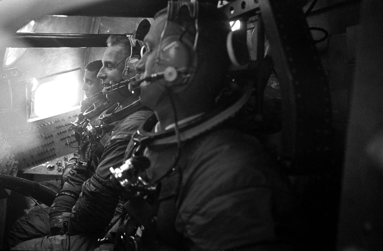 S68-52941 (25 Oct. 1968) --- The Apollo 8 prime crew is seen inside Apollo Boilerplate 1102A during water egress training in the Gulf of Mexico. From the foreground are astronauts Frank Borman, commander; James A. Lovell Jr., command module pilot; and William A. Anders, lunar module pilot. Photo credit: NASA