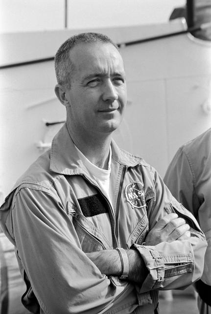Astronaut James A. McDivitt on deck of ship prior to water egress training