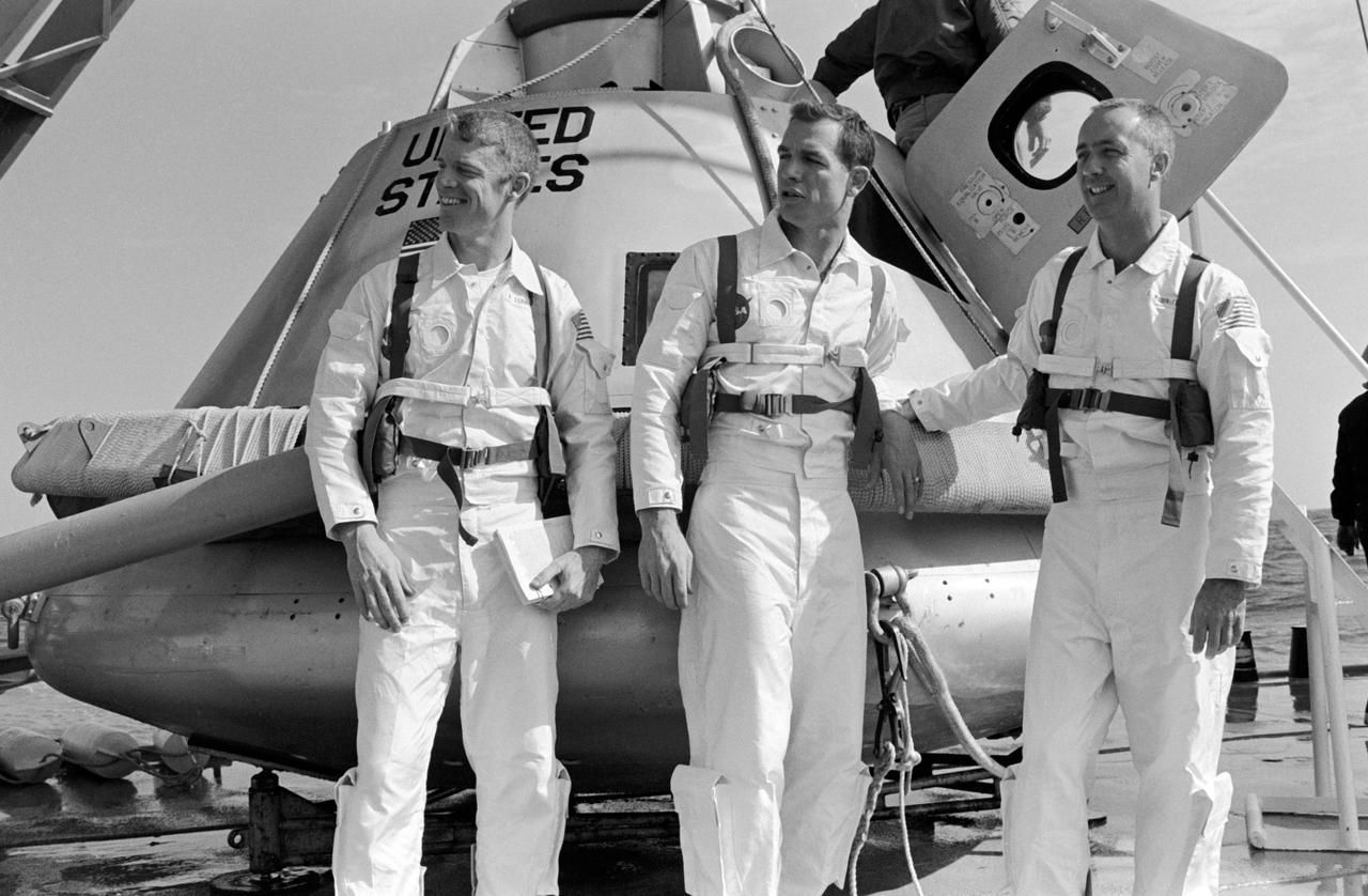 S68-54841 (5 Nov. 1968) --- The prime crew of the Apollo 9 (Spacecraft 104/Lunar Module 3/Saturn 504) space mission stands on the deck of the NASA Motor Vessel Retriever (MVR) prior to participating in water egress training in the Gulf of Mexico. Left to right, are astronauts Russell L. Schweickart, lunar module pilot; David R. Scott, command module pilot; and James A. McDivitt, commander. In background is the Apollo Command Module (CM) boilerplate which was used in the training exercise.