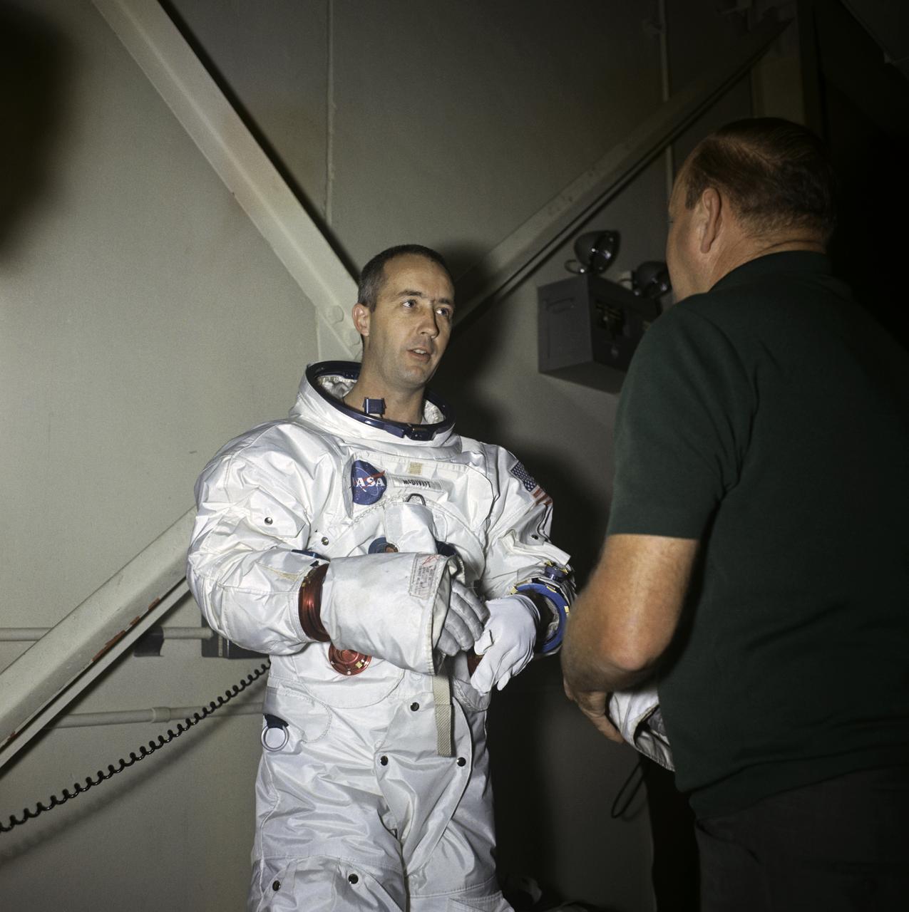 MCDIVITT, JAMES A. - SUITING View of General (Astronaut) James A. McDivitt in the bldg. 5 suiting room.