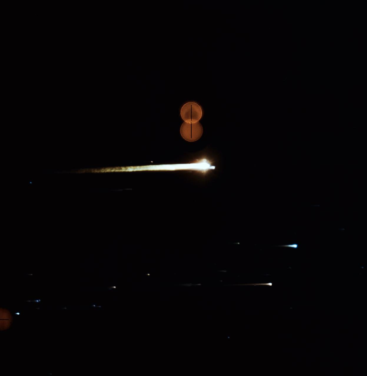 S69-15592 (27 Dec. 1968) --- This Apollo 8 re-entry photograph was taken by U.S. Air Force Airborne Lightweight Optical Tracking System (ALOTS) camera mounted on a KC-135-A aircraft flown at 40,000 feet altitude. Apollo 8, with astronauts Frank Borman, James A. Lovell Jr., and William A. Anders aboard, splashed down at 10:51 a.m. (EST) Dec. 27, 1968, in the central Pacific approximately 1,000 miles south-southwest of Hawaii.