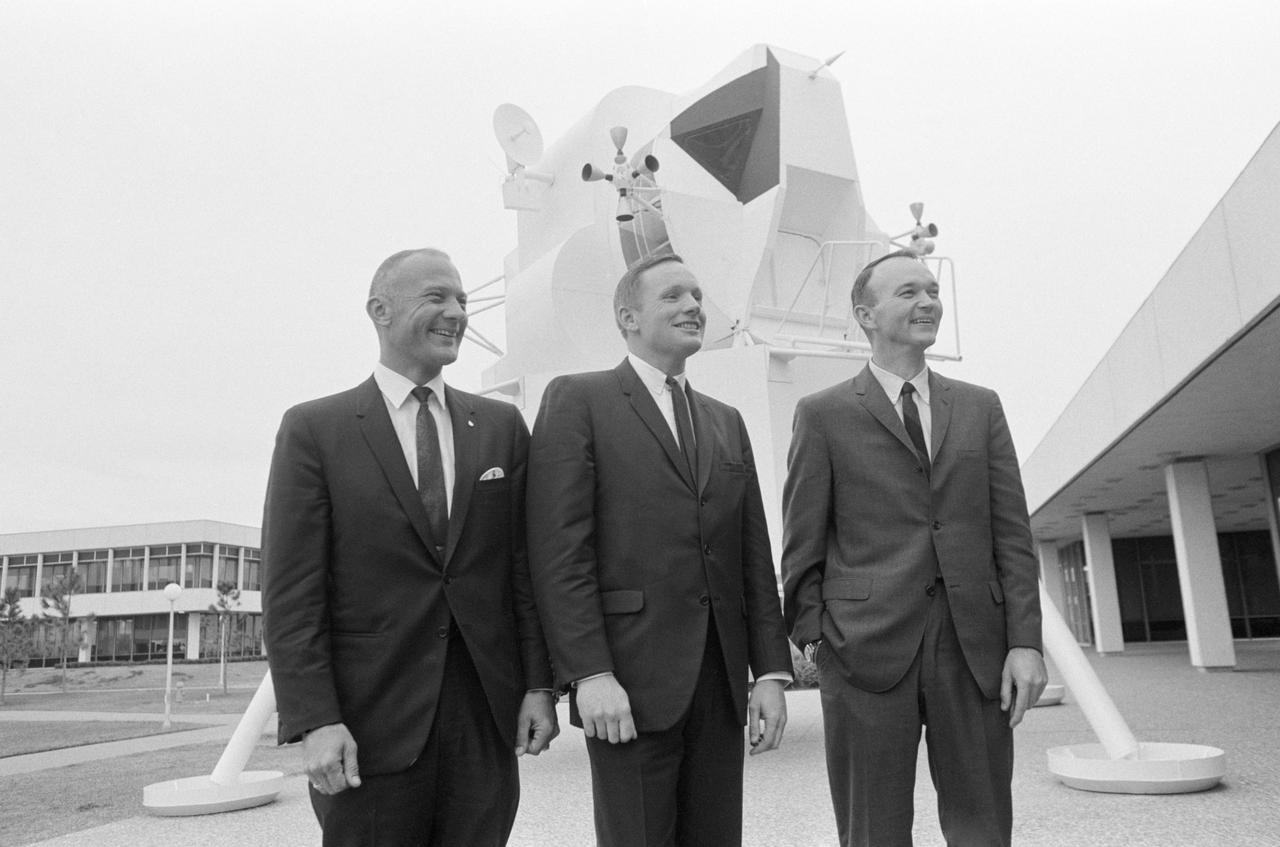S69-16681 (10 Jan. 1969) --- These three astronauts have been selected by NASA as the prime crew of the Apollo 11 lunar landing mission. Left to right, are astronauts Edwin E. Aldrin Jr., lunar module pilot; Neil A. Armstrong, commander; and Michael Collins, command module pilot. They were photographed in front of a lunar module (LM) mock-up beside Building 1 following a press conference in the MSC Auditorium.