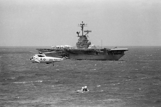 NASA image: U.S.S. Hornet moves toward the Apollo 12 Command Module to retrieve it