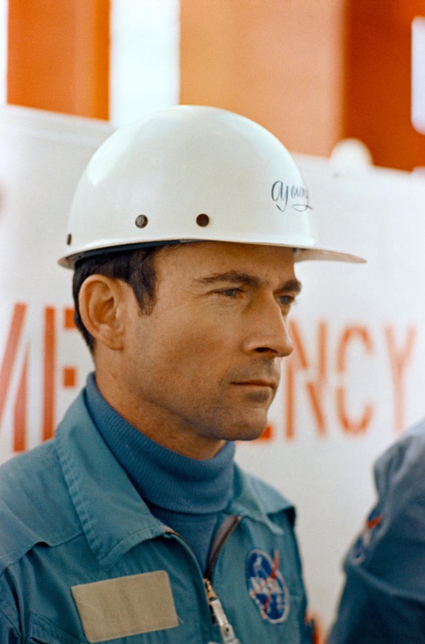 S69-30250 (27 March 1969) --- Astronaut John W. Young, wearing a protective hat, participates in pad egress training at the Kennedy Space Center's Pad 39B during preparations for the scheduled Apollo 10 lunar orbit mission. Young is the Apollo 10 command module pilot.