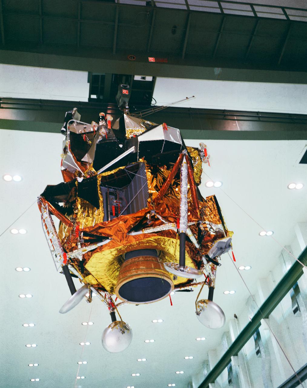 S69-32396 (4 April 1969) --- Interior view of the Kennedy Space Center's (KSC) Manned Spacecraft Operations Building showing Lunar Module (LM) 5 being moved from work stand for mating with its Spacecraft Lunar Module Adapter (SLA).  LM-5 is scheduled to be flown on the Apollo 11 lunar landing mission.