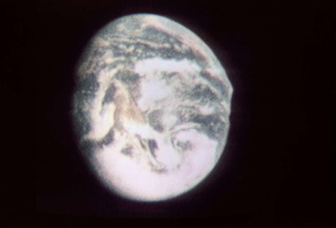 S69-33995 (18 May 1969) --- A cloud-covered Earth from about 12,800 nautical miles away is seen in this color reproduction taken from the second TV transmission made by the color television camera on board the Apollo 10 spacecraft. The United States and Mexico are located at right center. The more cloud-free area is the western and southwestern part of the U.S. and northern Mexico. Clouds cover the eastern half of the U.S. Aboard the Apollo 10 spacecraft on its trans-lunar course toward the moon were astronauts Thomas P. Stafford, commander; John W. Young, command module pilot; and Eugene A. Cernan, lunar module pilot.