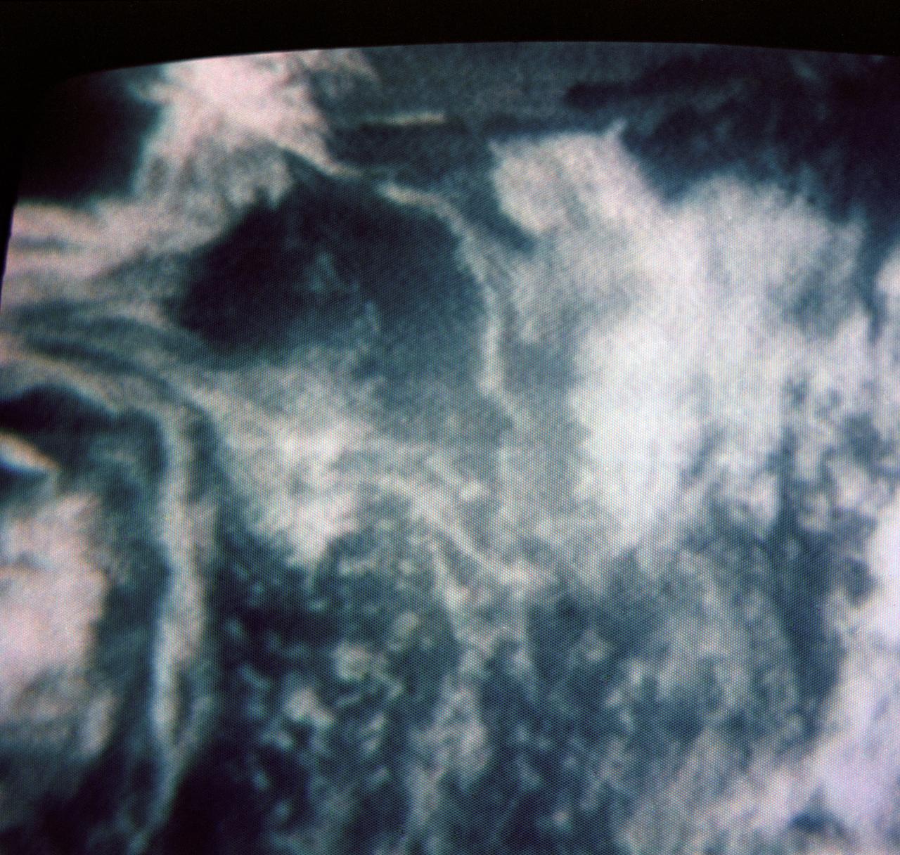 S69-33996 (18 May 1969) --- A cloud-covered Pacific Ocean, and the western part of the United States and Mexico, from about 12,800 nautical miles away are seen in this color reproduction taken from the second TV transmission made by the color television camera aboard the Apollo 10 spacecraft. The camera's zoom lens was used to get this view. The Pacific Ocean covers four-fifths of the picture. On the right is the land mass of North America. This view of the western coast extends from the southern tip of Baja California, Mexico, northward to British Columbia. Mexico, California, Nevada, and Arizona have few clouds; but Washington and Oregon are heavily cloud-covered.