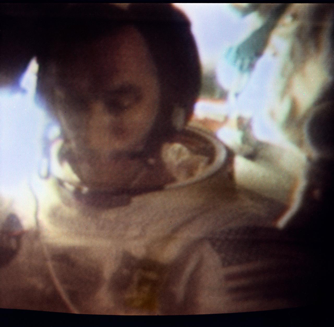 S69-33997 (18 May 1969) --- Astronauts Eugene A. Cernan, Apollo 10 lunar module pilot, is seen in this color reproduction taken from the third television transmission made by the color television camera aboard the Apollo 10 spacecraft. When this picture was made the Apollo 10 spacecraft was on a trans-lunar course, and was already about 36,000 nautical miles from Earth. Also, aboard Apollo 10 were astronauts Thomas P. Stafford, commander; and John W. Young, command module pilot.