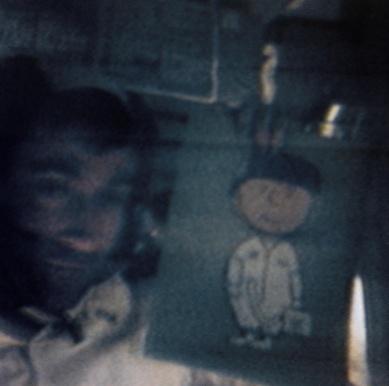 S69-34075 (19 May 1969) --- Astronaut John W. Young, Apollo 10 command module pilot, displays a drawing of Charlie Brown in this color reproduction taken from the fourth telecast made by the color television camera aboard the Apollo 10 spacecraft. When this picture was made the Apollo 10 spacecraft was about halfway to the moon, or approximately 112,000 nautical miles from Earth. ?Charlie Brown? will be the code name of the Command Module (CM) during Apollo 10 operations when the Lunar Module (LM) and CM are separated. The LM's code name will be ?Snoopy?. Also, aboard Apollo 10 were astronauts Thomas P. Stafford, commander; and Eugene A. Cernan, lunar module pilot.
