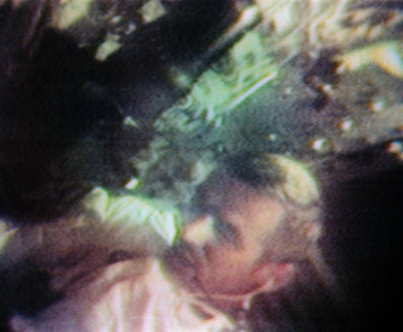 S69-34968 (24 May 1969) --- Astronaut Eugene A. Cernan, Apollo 10 lunar module pilot, is seen in this color reproduction taken from a telecast made by the color television camera aboard the Apollo 10 spacecraft during its trans-Earth journey home.