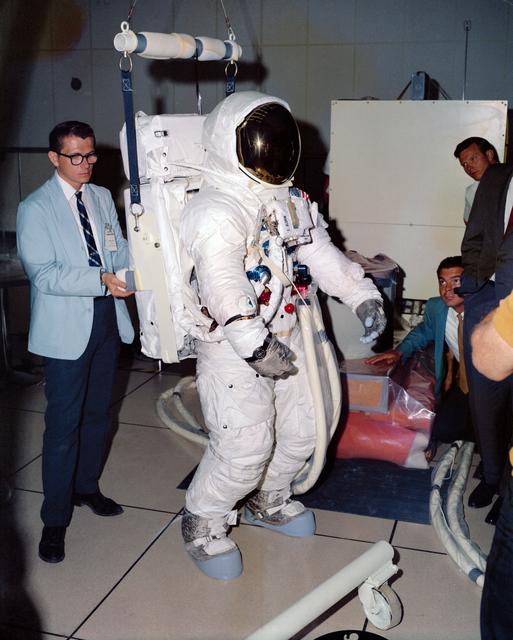Astronaut Edwin Aldrin in EMU verifies fit of Portable Life Support System