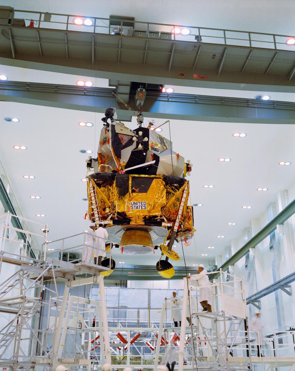 S69-39262 (23 June 1969) --- Lunar Module (LM) 6, scheduled for the Apollo 12 lunar landing mission in November 1969, is being moved to an integration work stand in the Kennedy Space Center's (KSC) Manned Spacecraft Operations Building. The two prime crew members scheduled to use the LM-6 to descend to the lunar surface following separation from the Command and Service Modules (CSM) and to later return to the CSM are astronauts Charles Conrad Jr., commander, and Alan L. Bean, lunar module pilot. Astronaut Richard F. Gordon Jr. is the prime crew's command module pilot.