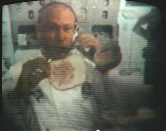 NASA image: Astronaut Edwin Aldrin makes sandwich in zero gravity condition