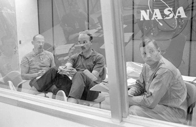 NASA image: Apollo 11 crewmen during first postflight debriefing