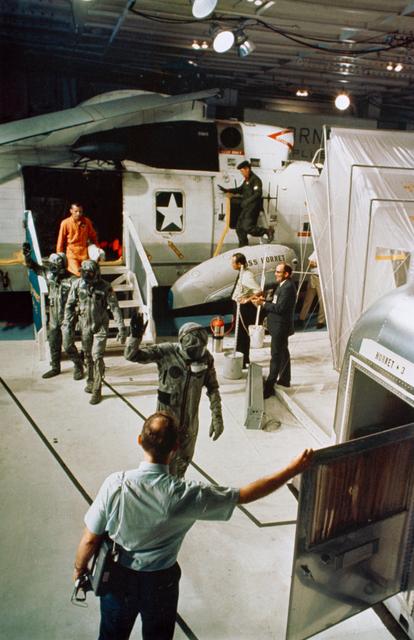 NASA image: Apollo 11 crewmen arrive aboard U.S.S. Hornet during recovery operation