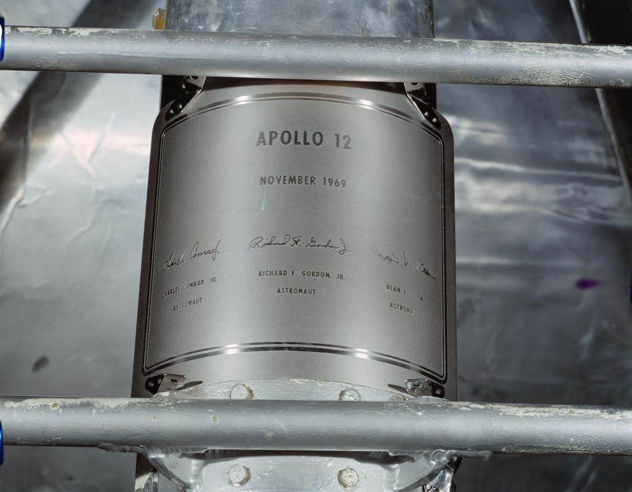 S69-53326 (November 1969) --- Close-up view of a replica of the plaque which the Apollo 12 astronauts will leave on the moon in commemoration of their flight. The plaque will be attached to the ladder on the landing gear strut on the descent stage of the Apollo 12 Lunar Module (LM). Apollo 12 will be the United States' second lunar landing mission.