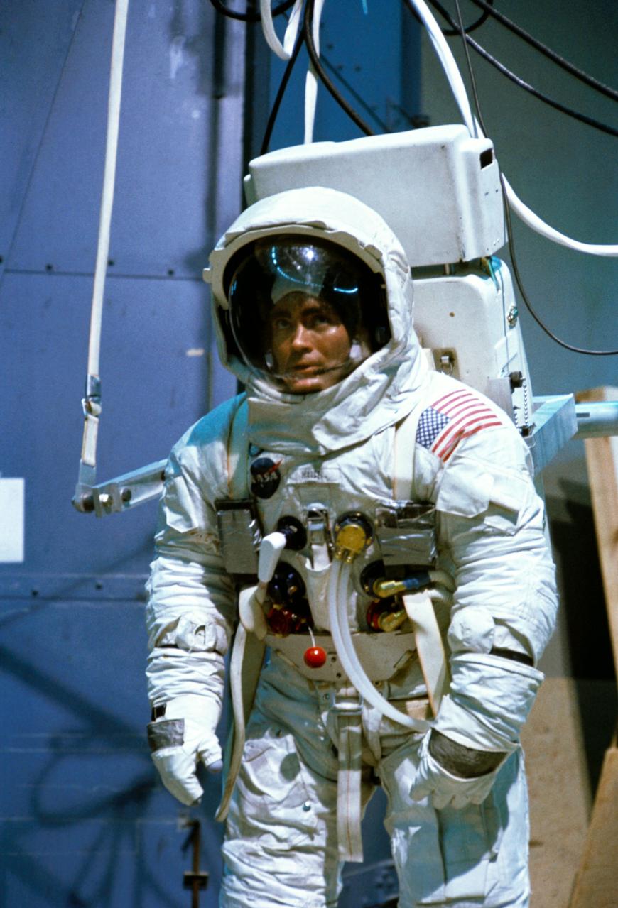 S70-24012 (19 Jan. 1970) --- Astronaut Fred W. Haise Jr., lunar module pilot of the Apollo 13 lunar landing mission, participates in lunar surface simulation training at the Manned Spacecraft Center (MSC).  Haise is attached to a Six Degrees of Freedom Simulator.