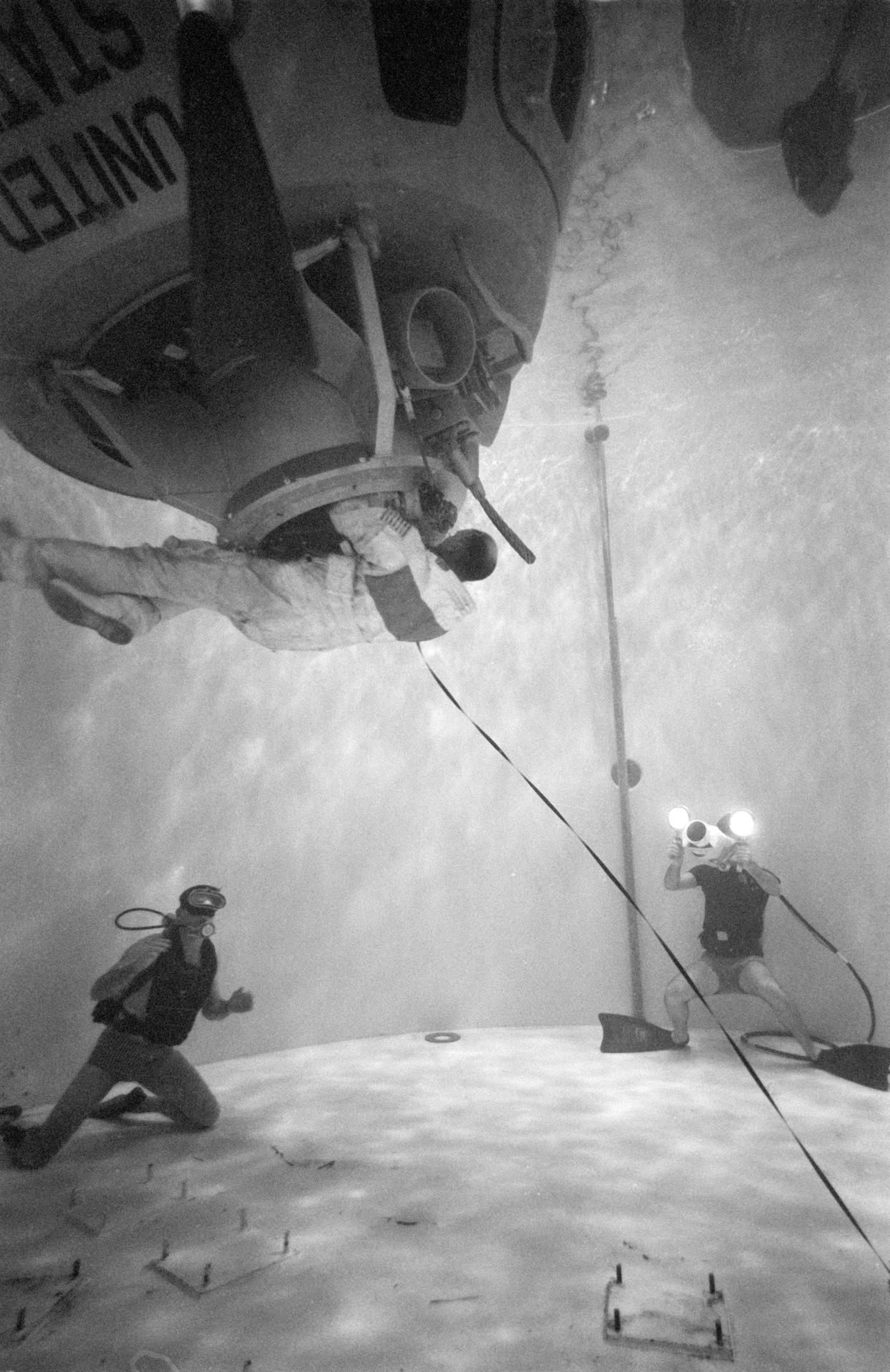 Ken Mattingly particpates in water egress training at the Manned Spacecraft Center