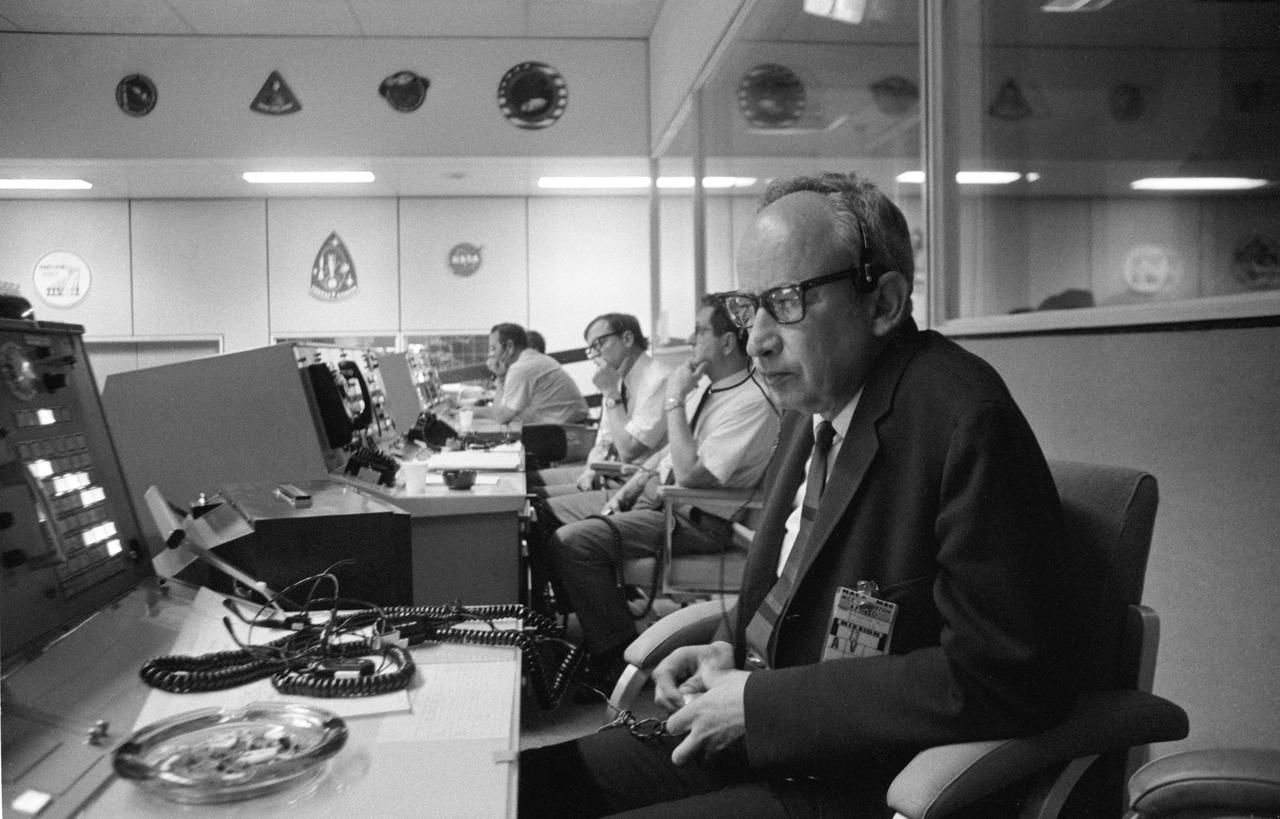 S70-34627 (11 April 1970) --- Sigurd A. Sjoberg, director of flight operations, at the Manned Spacecraft Center (MSC), views the Apollo 13 liftoff from a console in the MSC Mission Control Center (MCC), Building 30.  Apollo 13 lifted off at 1:13 p.m. (CST) April 11, 1970.  Photo credit: NASA