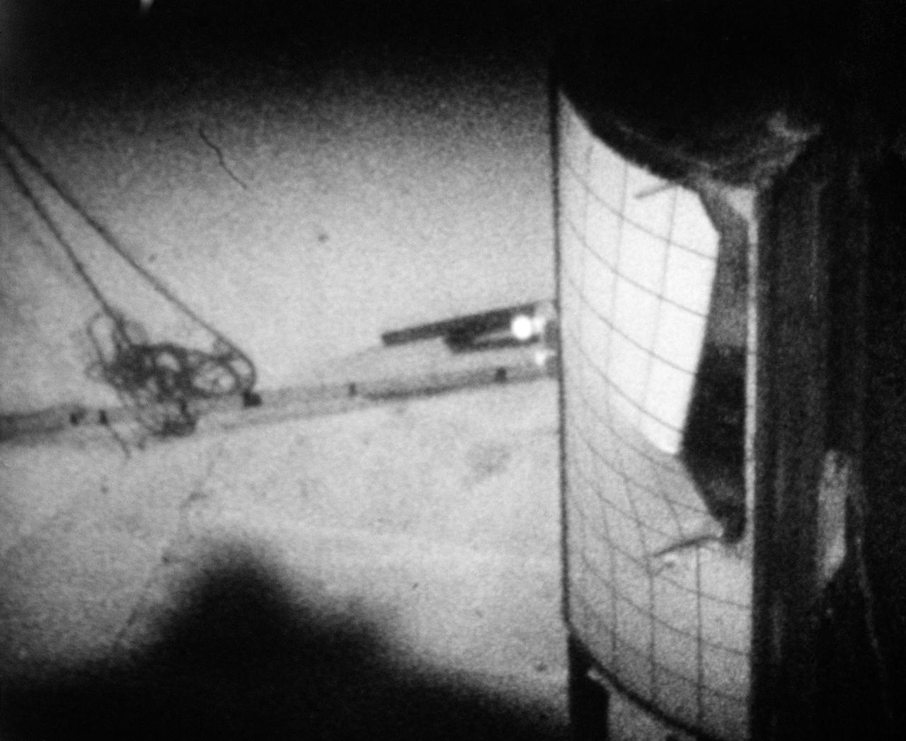 S70-41982 (June 1970) --- Sequence photo from 16mm motion picture film of test at National Aeronautics and Space Administration's Langley Research Center which seeks to determine mechanism by which Apollo 13 panel was separated from the Service Module. Test used a 1/2 scale model with a honeycomb sandwich panel and was conducted in a vacuum. (First of three photographs in sequence). Photo credit: NASA