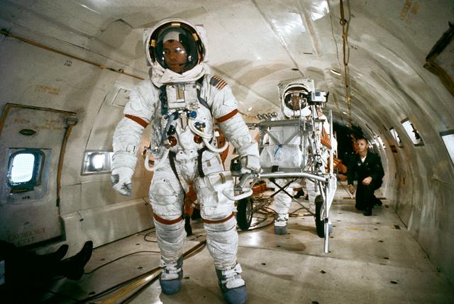 NASA image: Astronaut Alan Shepard with Modular Equipment Transporter aboard KC-135