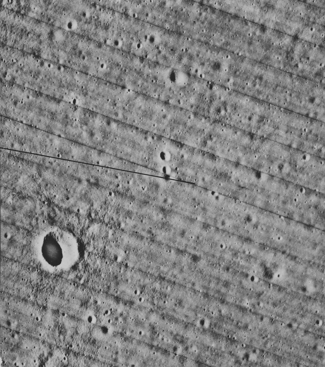 S70-54740 (December 1970) --- A lunar orbiter photograph showing a vertical view of the Apollo 14 landing site located in the Fra Mauro highlands on the lunar nearside. The predicted landing point is 17 degrees 27 minutes 46 seconds west longitude and 3 degrees 40 minutes 19 seconds south latitude. North is toward the right side of the picture. Cone Crater, the largest lunar feature visible, is located near the northeast corner of the photograph. The landing point is between Triplet Crater and Doublet Crater in the center of the picture.