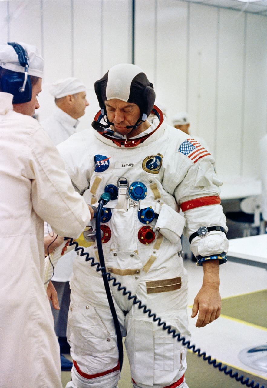 S71-16638 (31 Jan. 1971) --- Astronaut Alan B. Shepard Jr., commander, undergoes suiting up operations at the Kennedy Space Center (KSC) during the Apollo 14 prelaunch countdown. Apollo 14, with astronauts Shepard; Edgar D. Mitchell, lunar module pilot; and Stuart A. Roosa, command module pilot; aboard was launched from Pad A, Launch Complex 39 at 4:03:02 p.m. (EST), Jan. 31, 1971.
