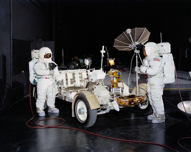 Members of Apollo 15 crew shown with Lunar Roving Vehicle One-G trainer