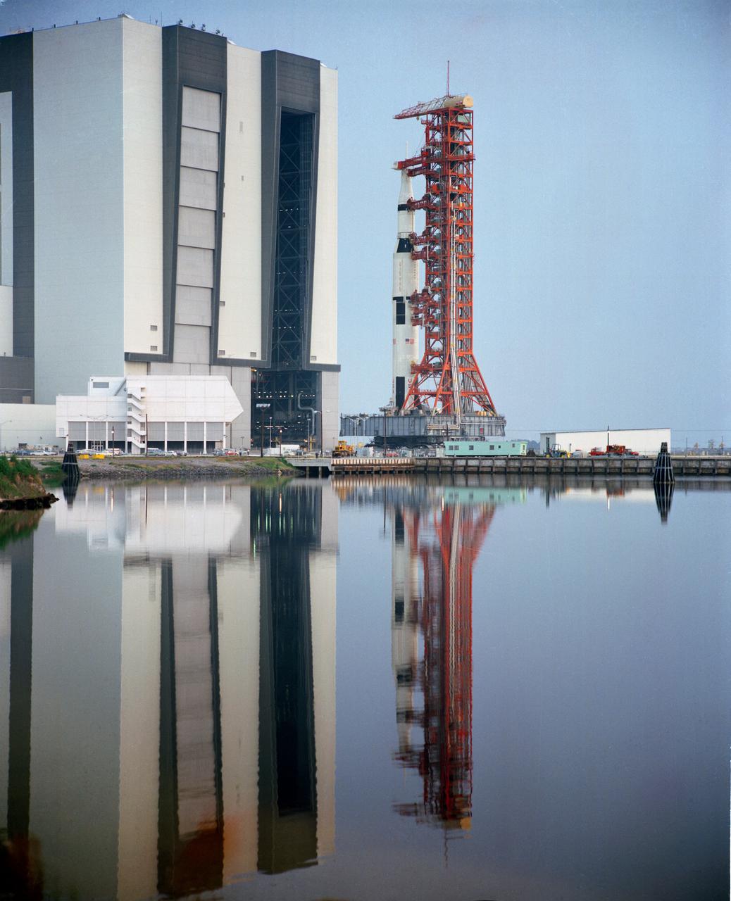 S71-33786 (11 May 1971) --- The 363-feet tall Apollo (Spacecraft 112/Lunar Module 10/Saturn 510) space vehicle which leaves the Vehicle Assembly Building (VAB) to Pad A, Launch Complex 39, Kennedy Space Center (KSC). The Saturn V stack and its mobile launch tower are atop a huge crawler-transporter. Apollo 15 is scheduled as the fourth manned lunar landing mission by the National Aeronautics and Space Administration (NASA) and is scheduled to lift off on July 26, 1971. The crew men will be astronauts David R. Scott, commander; Alfred M. Worden, command module pilot; and James B. Irwin, lunar module pilot. While astronaut Scott and Irwin will descend in the Lunar Module (LM) to explore the moon, astronaut Worden will remain with the Command and Service Modules (CSM) in lunar orbit.