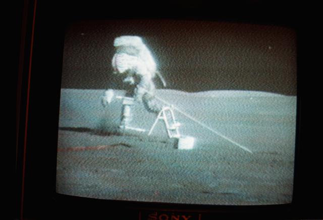 NASA image: Astronaut David Scott using Apollo Lunar Surface Drill during second EVA