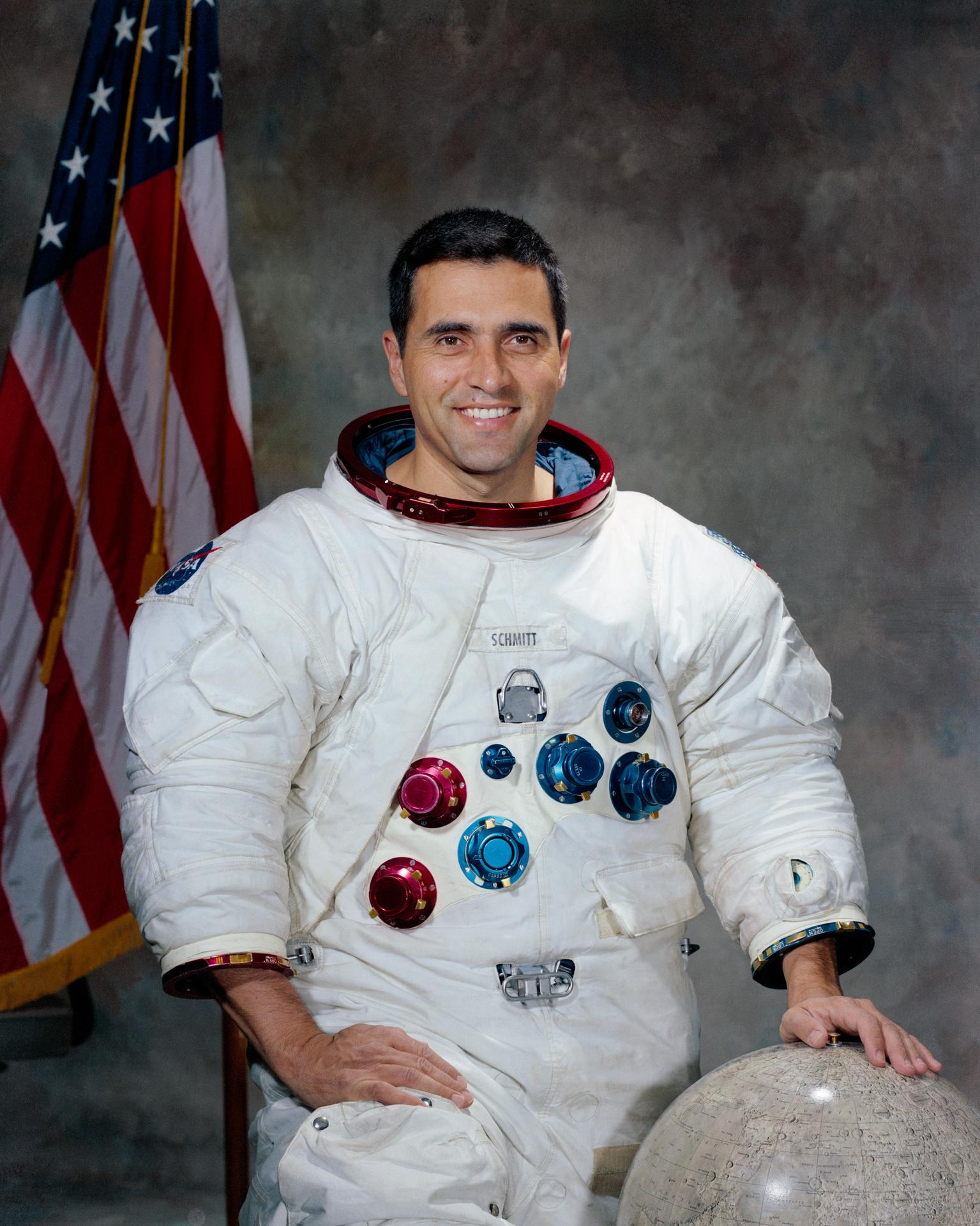 Harrison Schmidt, the last man to walk on the moon poses in his white Apollo spacesuit