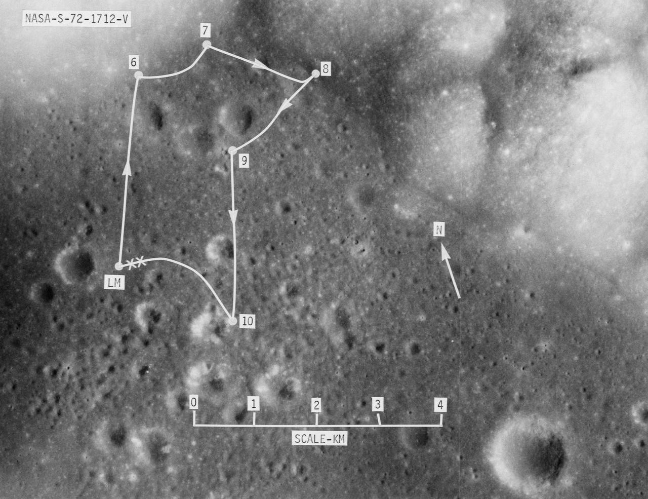 S72-01712 (July 1972) --- A vertical view of the Apollo 17 landing site in the Taurus-Littrow area of the lunar nearside, with an overlay showing the Lunar Roving Vehicle traverse proposed for the third extravehicular activity. The scale at the bottom is measured in kilometers. One kilometer equals 0.6214 statute miles. The coordinates of the Apollo 17 touchdown point are 30 degrees 44 minutes 58 seconds east longitude and 20 degrees 9 minutes 50 seconds north latitude. This photograph was taken from lunar orbit on an earlier Apollo mission.