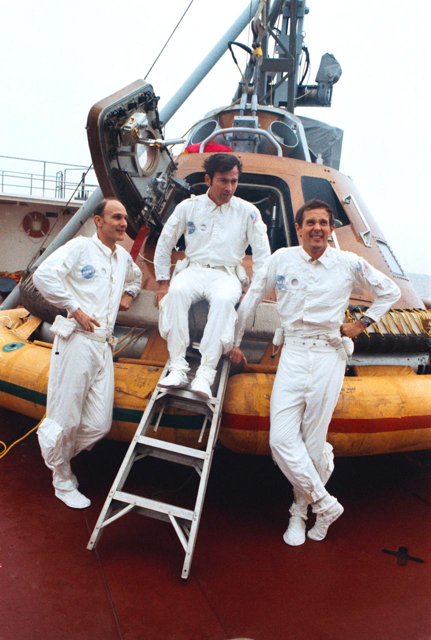 S72-30160 (5 May 1972) --- The Apollo 16 prime crew relax aboard the NASA Motor Vessel Retriever during water egress training activity in the Gulf of Mexico. They are, left to right, astronauts Thomas K. Mattingly II, command module pilot; John W. Young, commander; and Charles M. Duke Jr., lunar module pilot. The Command Module trainer was used in the training exercise.