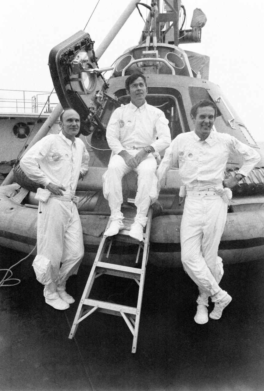 S72-30166 (5 May 1972) --- The Apollo 16 prime crew relax aboard the NASA Motor Vessel Retriever during water egress training activity in the Gulf of Mexico. They are, left to right, astronauts Thomas K. Mattingly II, command module pilot; John W. Young, commander; and Charles M. Duke Jr., lunar module pilot. The Command Module trainer was used in the training exercise.