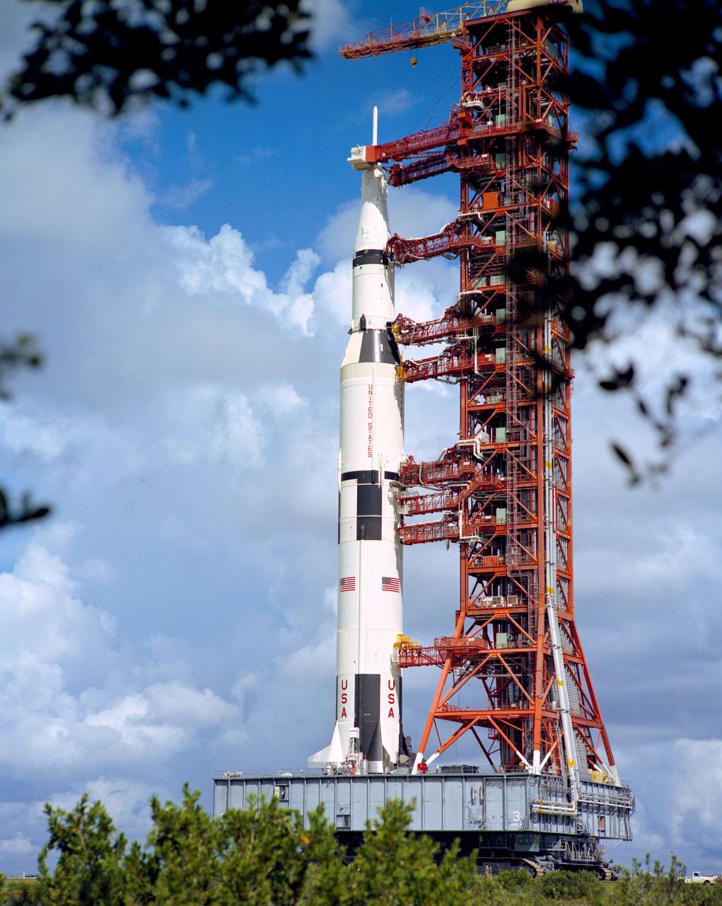 S72-48729 (28 Aug. 1972) --- A ground-level view of the huge Apollo 17 (Spacecraft 114/Lunar Module 12/ Saturn 512) space vehicle on its way to Pad A, Launch Complex 39, Kennedy Space Center (KSC). The Saturn V stack and its mobile launch tower are atop a mammoth crawler-transporter. The prime crew for the Apollo 17 lunar landing mission will be astronauts Eugene A. Cernan, commander; Ronald E. Evans, command module pilot; and scientist-astronaut Harrison H. Schmitt, lunar module pilot.