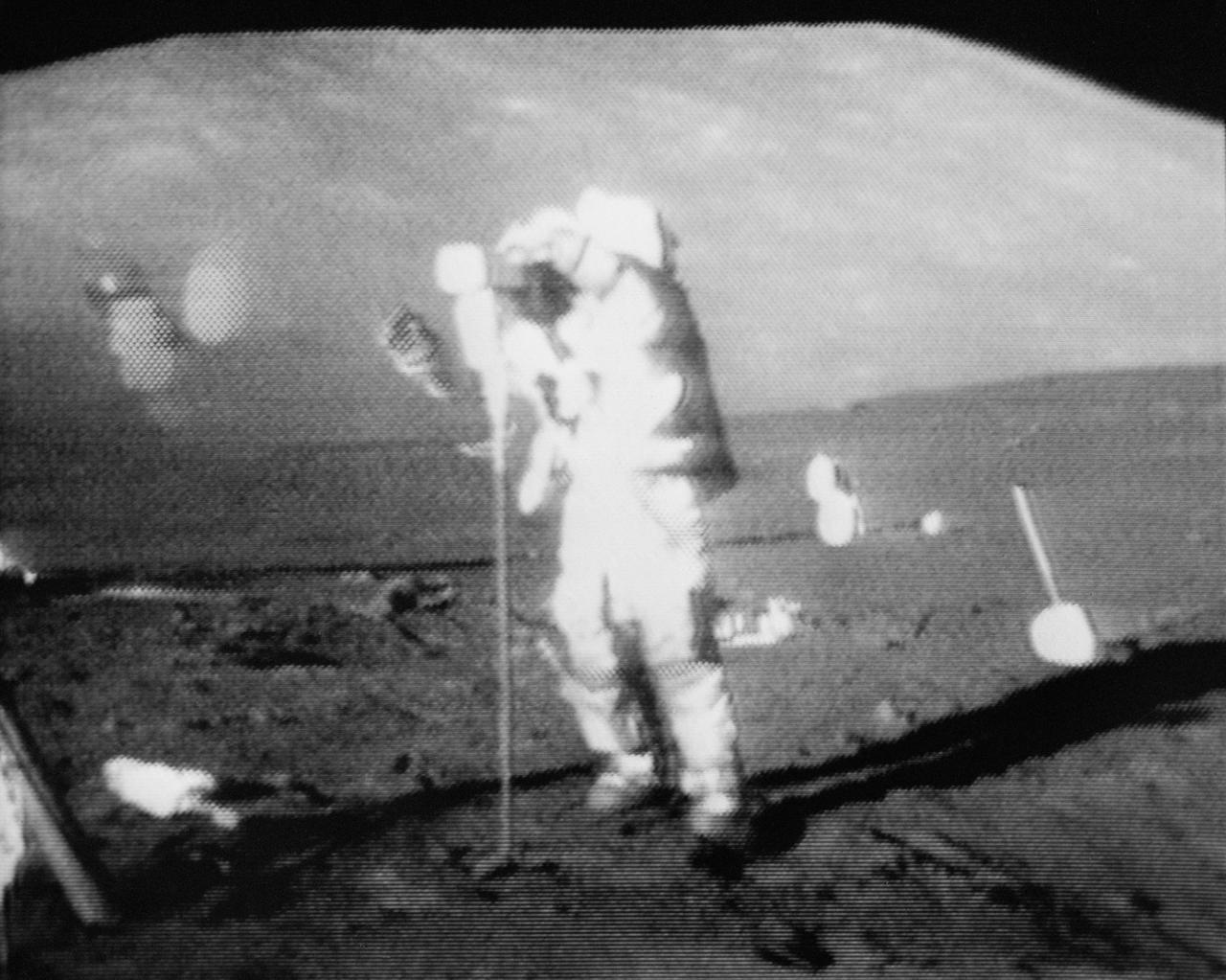 S72-55064 (11 Dec. 1972) --- Astronaut Eugene A. Cernan operates the Apollo Lunar Surface Drill during the first Apollo 17 extravehicular activity (EVA) at the Taurus-Littrow landing site, in this black and white reproduction taken from a color television transmission made by the RCA color TV camera mounted on the Lunar Roving Vehicle. Cernan is the commander of the Apollo 17 lunar landing mission. Astronaut Ronald E. Evans, command module pilot, remained with the Apollo 17 Command and Service Modules in lunar orbit while astronaut Cernan and scientist-astronaut Harrison H. Schmitt, lunar module pilot, descended in the Lunar Module to explore the moon.