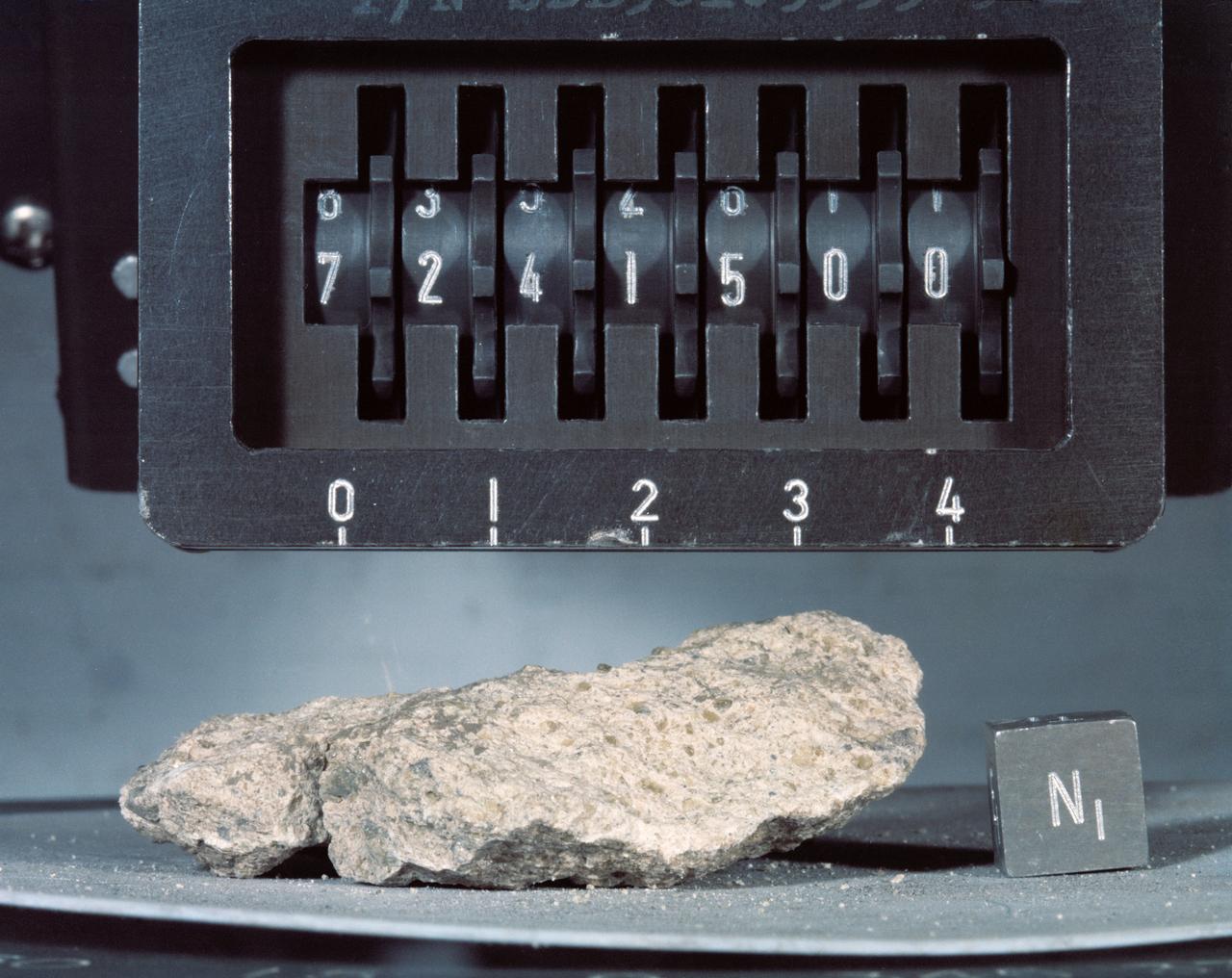 S73-16198 (December 1972) --- A close-up view of Apollo 17 lunar sample number 72415,0 which was brought back from the Taurus-Littrow landing site by the Apollo 17 crewmen. This sample is a brecciated dunite clast weighing a little over 32 grams (about 1.14 ounces). This sample was collected at station 2 (South Massif) during the second Apollo 17 extravehicular activity (EVA).