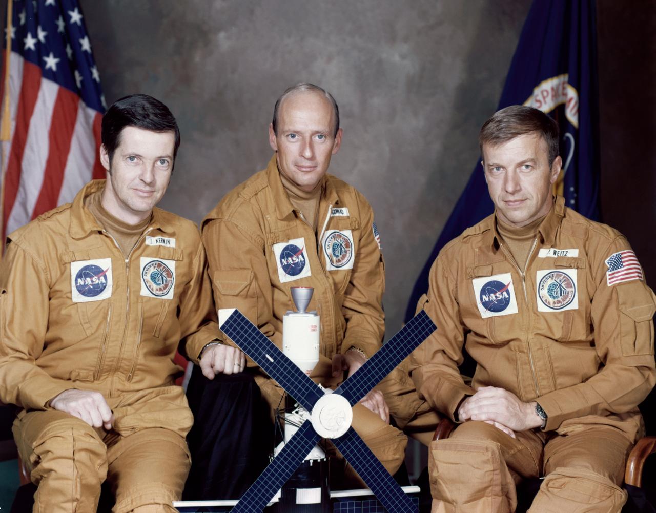 S73-24303 (May 1973) --- These three astronauts have been named by the National Aeronautics and Space Administration as the prime crew of the first manned Skylab mission. They are, left to right, Joseph P. Kerwin, science pilot; Charles Conrad Jr., commander; and Paul J. Weitz, pilot. Skylab is a three-part program consisting of one 28-day and two 56-day manned visits spanning an eight-month period. One day prior to the launch of this crew, the unmanned Skylab space station cluster will be launched and placed in Earth orbit. The first manned mission will last up to 28 days. Photo credit: NASA