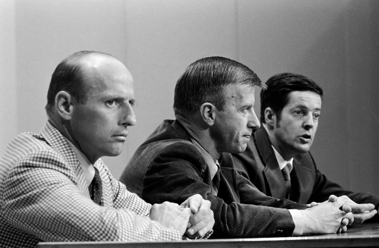 S73-24369 (17 April 1973) --- The three members of the prime crew of the first manned Skylab mission discuss their scheduled flight before a gathering of news media representatives, in building 1 auditorium, April 17, 1973. They are (left to right) astronauts Charles Conrad Jr., commander; Paul J. Weitz, pilot; and scientist Joseph P. Kerwin, science-pilot. Skylab is a three-part program consisting of one 28-day; and two 56-day manned visits spanning an eight-month period. One day prior to the launch of this crew, the unmanned Skylab Space Station cluster will be launched and placed in Earth orbit. The first manned mission will last up to 28 days. Photo credit: NASA