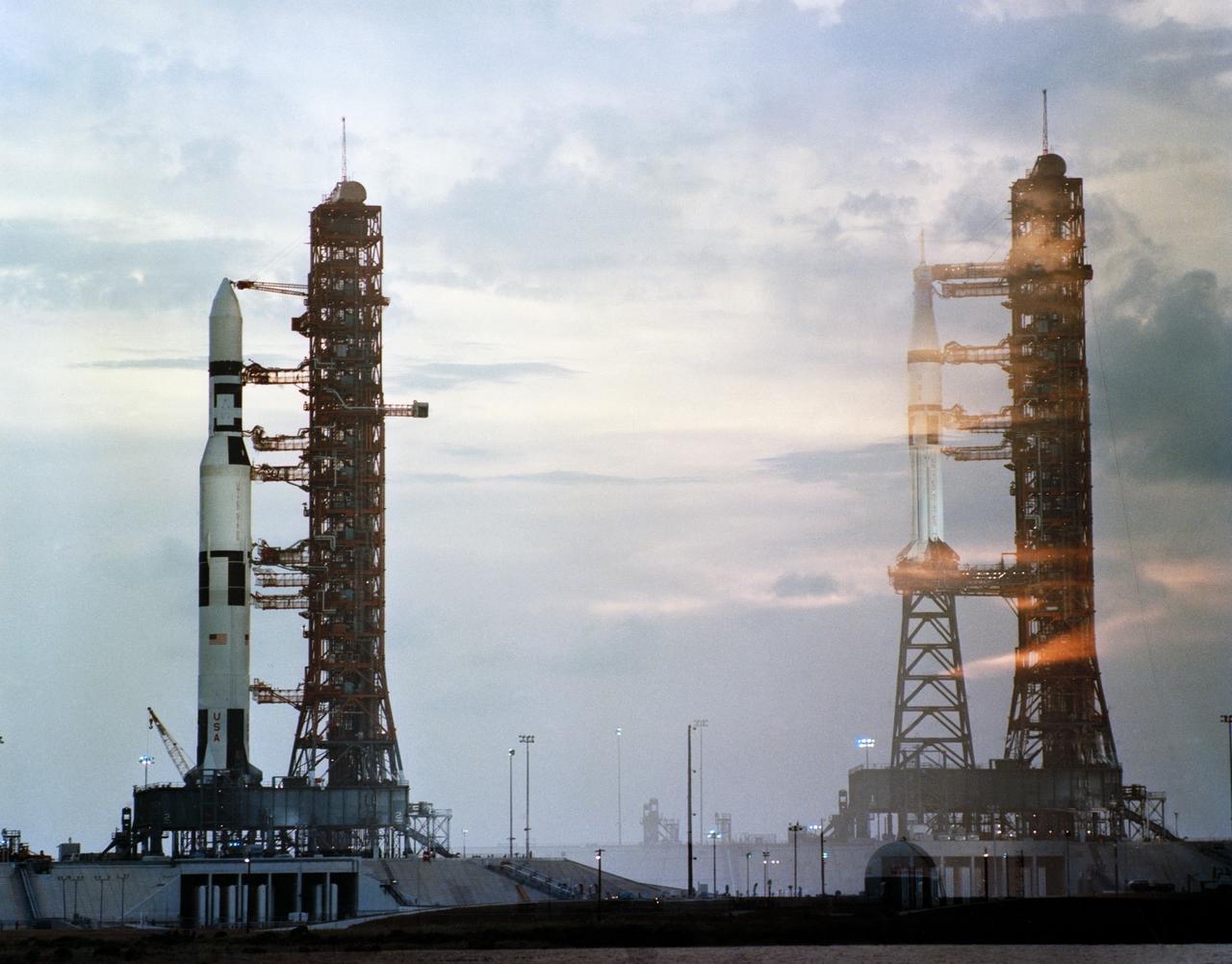 S73-25654 (7 May 1973) --- A deliberate double exposure to help illustrate the comparative sizes and configurations of the Skylab 1 and Skylab 2 space vehicles at Launch Complex 39, Kennedy Space Center, Florida. The double exposure creates an illusion that the rockets are side by side, though actually they are one and a half miles apart. The Skylab 1/ Saturn 1B space vehicle on Pad A is on the left. On the right is the Skylab 2/ Saturn 1B space vehicle on Pad B. The Skylab 1 payload is the space station cluster. The Skylab 2 payload will be an Apollo Command/Service Module (CSM) with astronauts Charles Conrad Jr., Joseph P. Kerwin and Paul J. Weitz aboard. The Saturn V launch vehicle is composed of a Saturn V first (S-1C) stage, a Saturn V second (S-11) stage, and the Skylab payload. The Saturn 1B launch vehicle consists of a Saturn 1B first (S-1B) stage, a Saturn 1B second (S-1VB) stage, and the CSM payload including its launch escape system. Photo credit: NASA