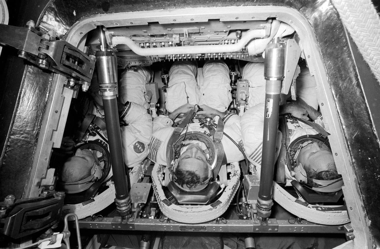 S73-27787 (1 May 1973) --- The three members of the prime crew of the second manned Skylab mission participate in prelaunch training, specifically water egress simulations, at the Johnson Space Center (JSC), Houston.  They are, left to right, astronaut Alan J. Bean, commander; scientist-astronaut Owen K. Garriott, science pilot; and astronaut Jack R. Lousma, pilot. This training took place in JSC?s Building 220 on May 1, 1973. Photo credit: NASA