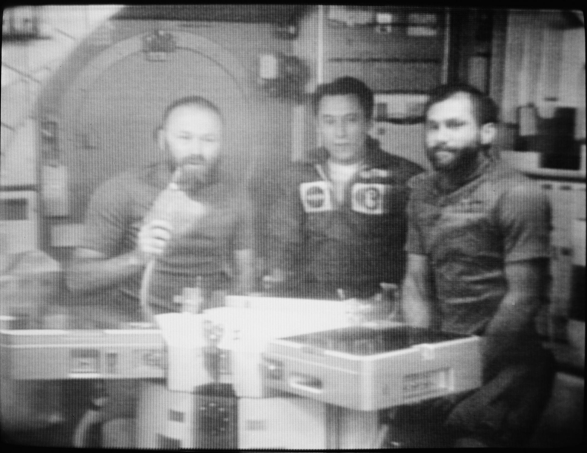 The Skylab 4 crew confer via television communication with Dr. Lubos Kohoutek on December 28, 1873.