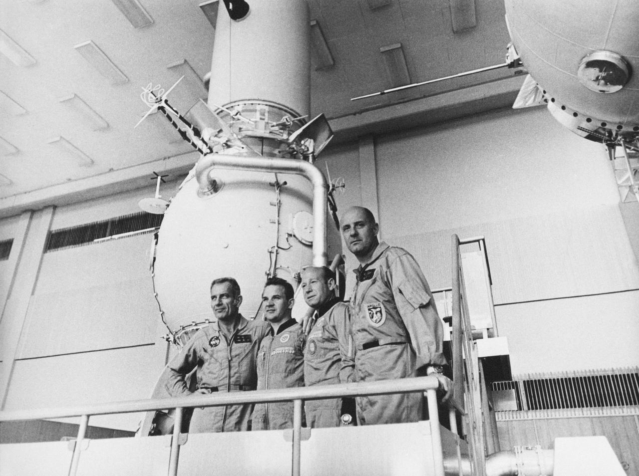 S74-25259 (June 1974) --- Four crewmen of the joint U.S.-USSR Apollo-Soyuz Test Project mission are photographed beside a Soyuz spacecraft trainer during ASTP crew training activity at the Cosmonaut Training Center (Star City) near Moscow. They are, left to right, astronaut Donald K. Slayton, docking module pilot of the American ASTP prime crew; cosmonaut Valeriy N. Kubasov, engineer of the Soviet ASTP first (prime) crew; cosmonaut Aleksey A. Leonov, commander of the Soviet ASTP first (prime) crew; and astronaut Thomas P. Stafford, commander of the American ASTP prime crew.