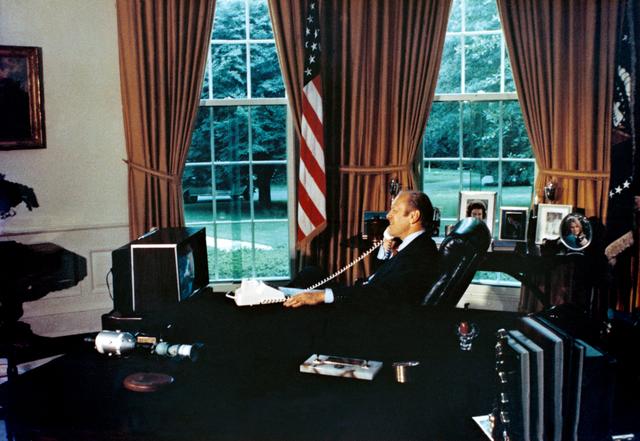 NASA image: President Gerald Ford talks to ASTP crewmen via radio-telephone