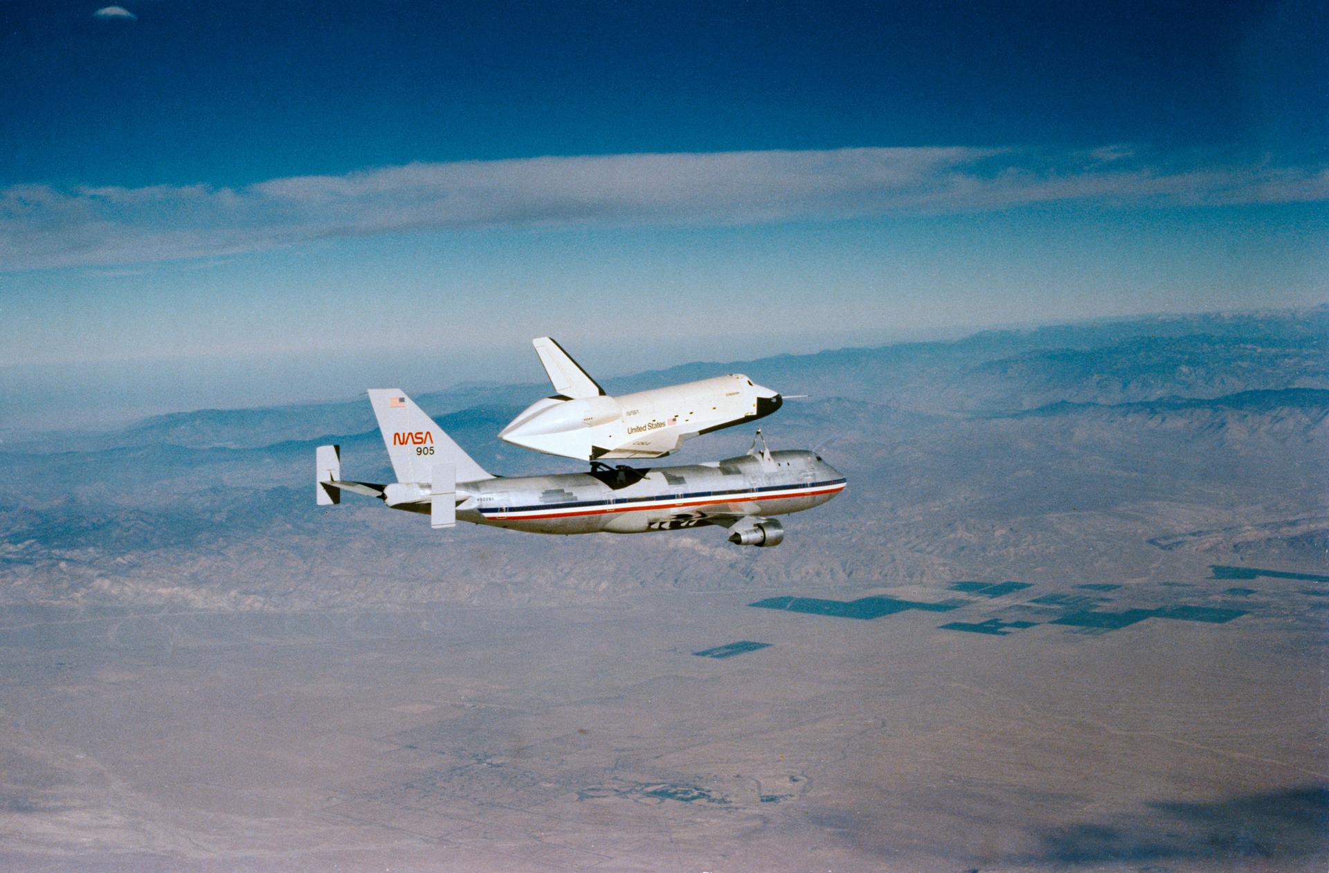The shuttle Orbiter 101 "Enterprise" separates from the NASA 747 carrier aircraft over the California desert