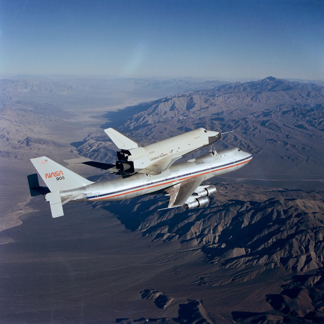 Frame of color news-released stills. This was a Tail Cone Off Mission.  Stack Enterprise and 747 in flight.