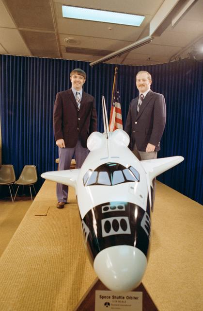 NASA image: View of astronaut candidates Brandenstein and Hauck behind model