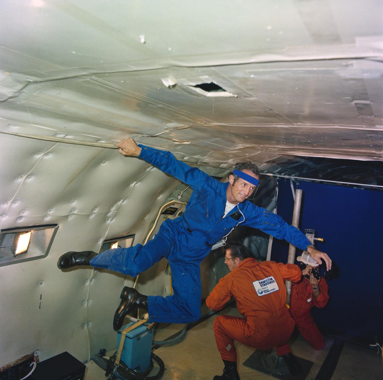 S79-30367/69:  Exterior views of 747 Shuttle Aircraft. S79-30360/66:  ASCAN Don Williams during H Reflex Studies and Hamilton-Standard Tool Belt and Suit Cooling System Tests.          1.  AIRCRAFT - 747     2.  SHUTTLE - TESTS.   S79-30360 thru S79-30369
