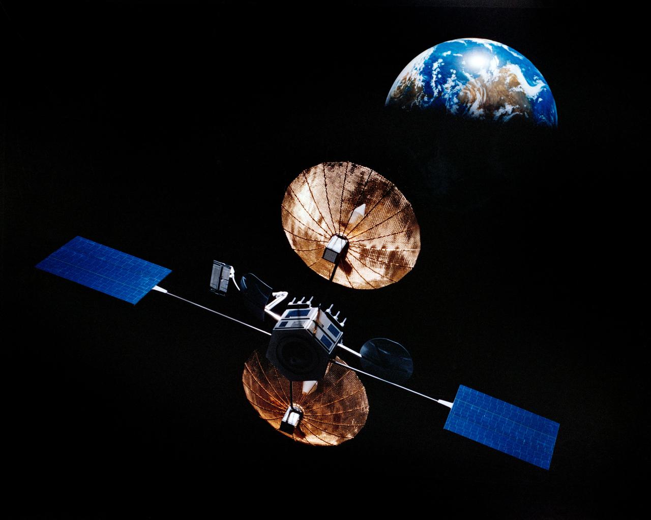 Artist concept of satellite with solar panels deployed in orbit above the earth.