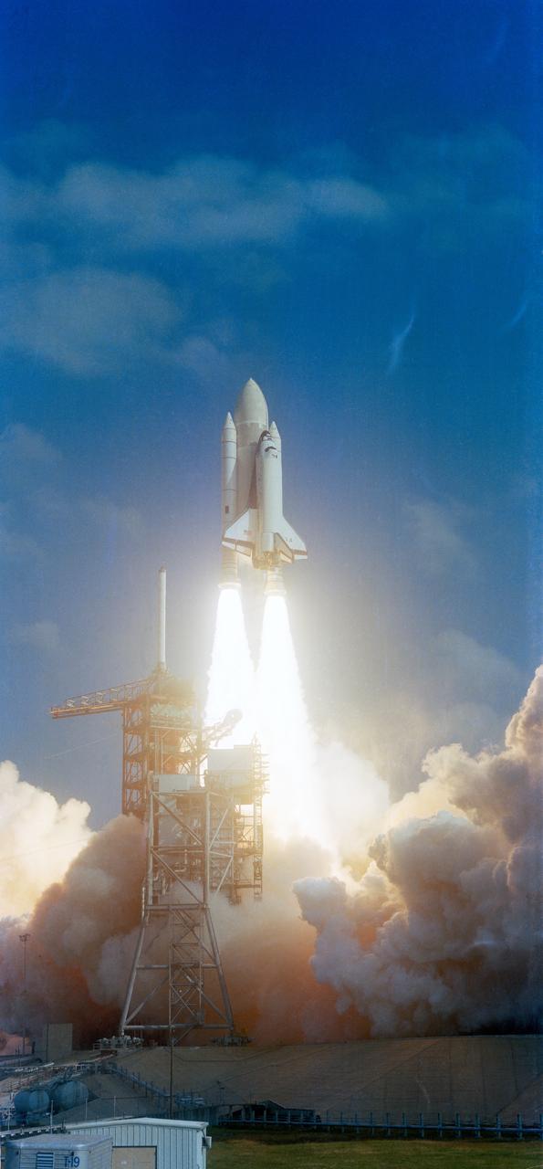The 122 foot tall Space Shuttle Orbiter Columbia mated to its external fuel container (ET) and two solid rocket boosters (SRB) lifts off from Launch Pad 39A for the begining of STS-2.